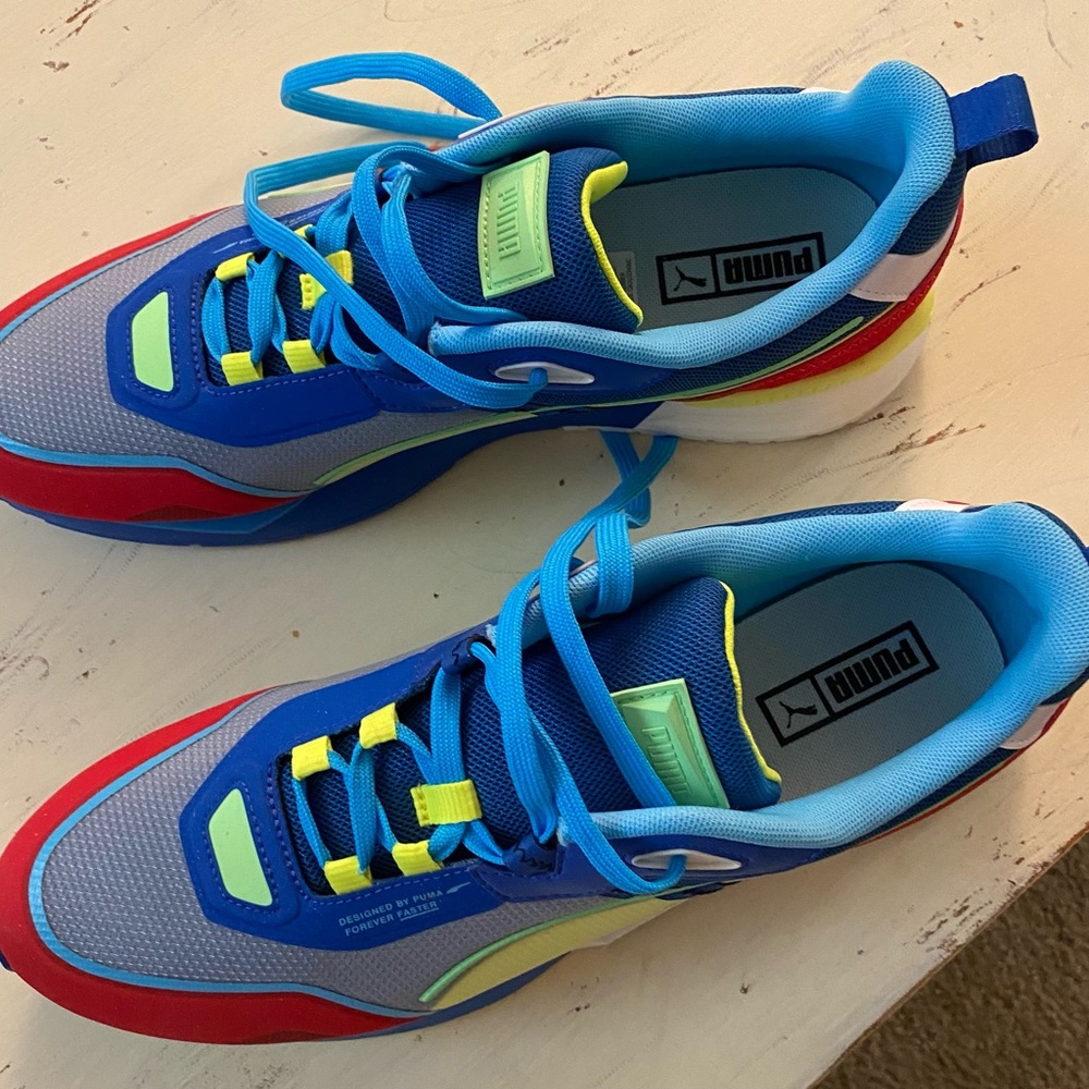 Never-worn new Puma size 13 training shoes